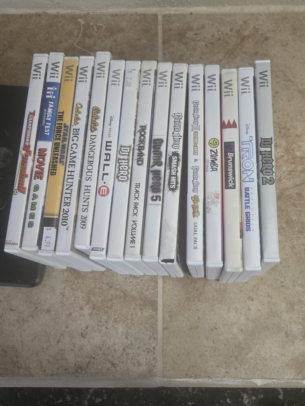 Nintendo White Wii Game Case Set with Blue, Yellow and Red Spine Accents